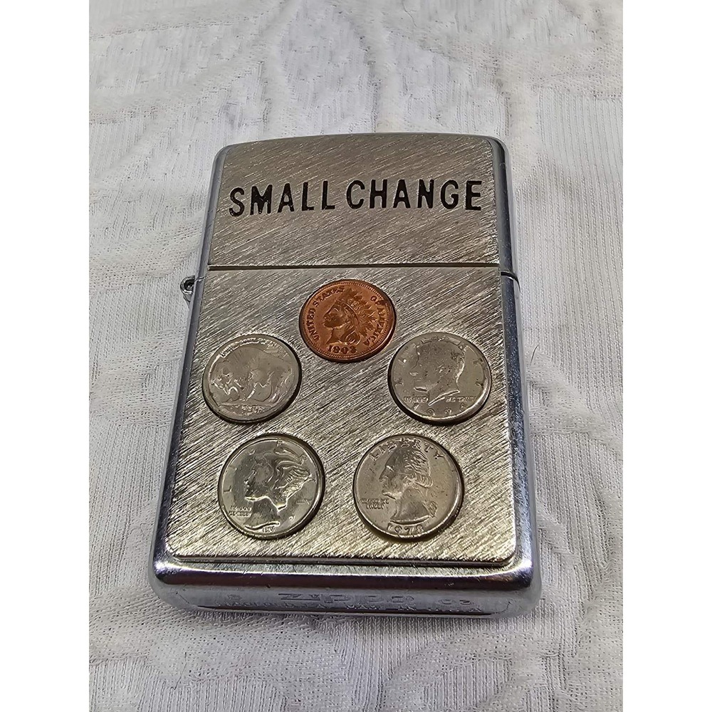 un used Vintage 2003 Small‎ Change Coins Emblem Zippo Lighter Not Copper